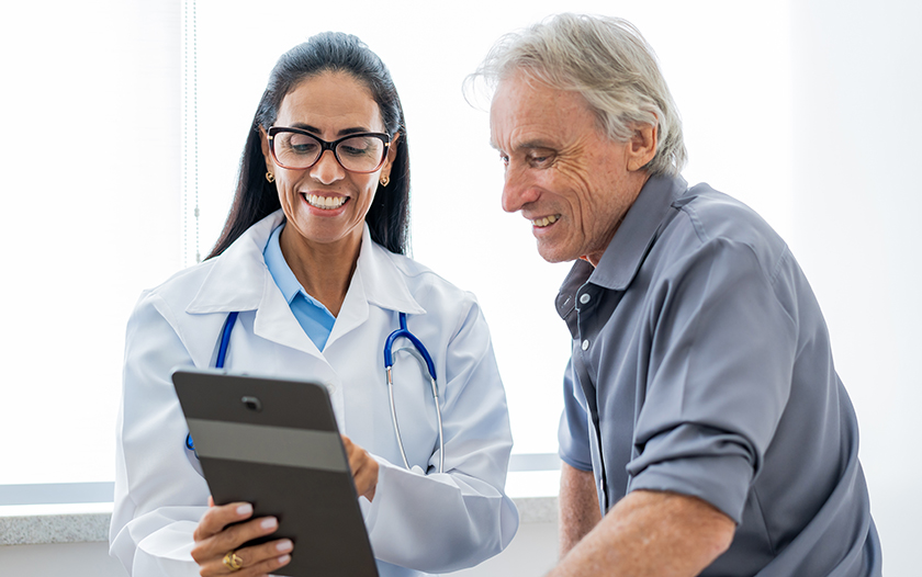 Physician talking to patient