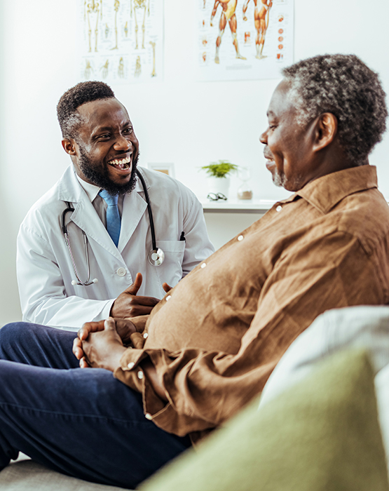 Physician speaking to patient