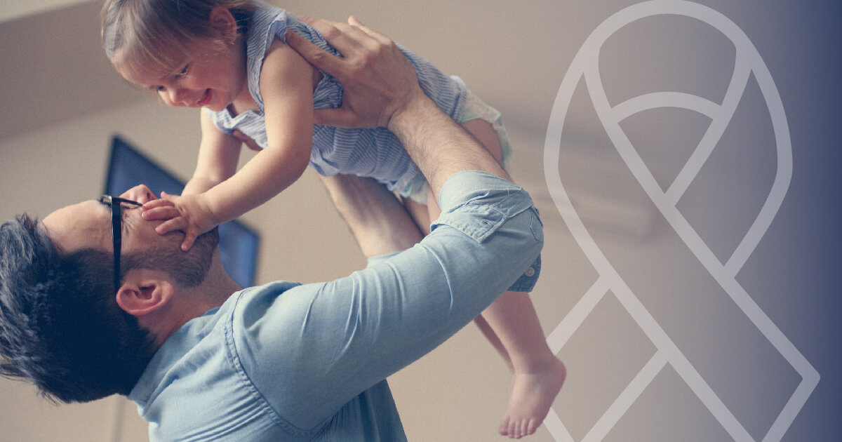 Person holding child in the air